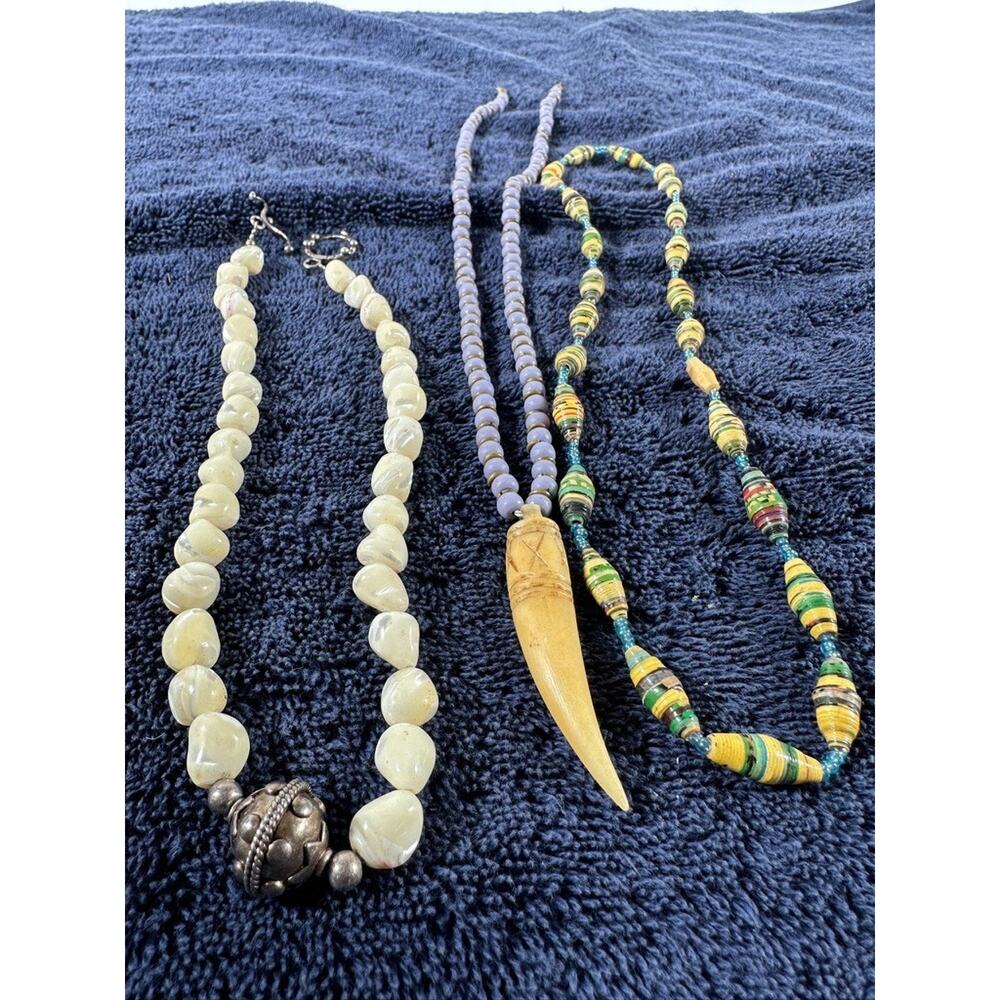 Lot of 3 assorted beaded necklaces with mixed materials and boho/tribal-style